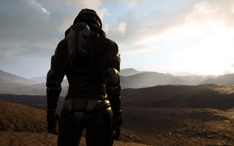 Player character in armored space suit explores a planet.