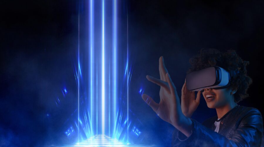 [MHX Digital Media, LLC]: A woman wearing a VR headset enjoys the experience.